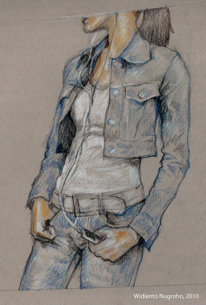 Close-up of a hand coloring over a grayscale image with a colored pencil, the gray shading visible beneath translucent color layers, showing the depth effect, warm desk lighting