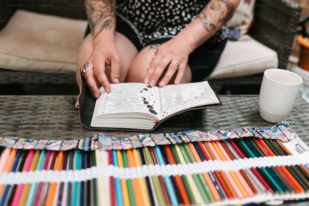 Close-up detail of colored pencil work on intricate coloring page