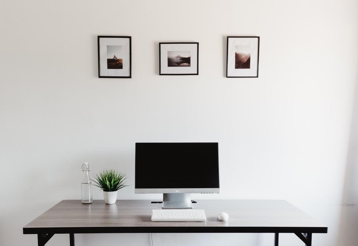 Coloring workspace setup with adult coloring book and organized colored pencils