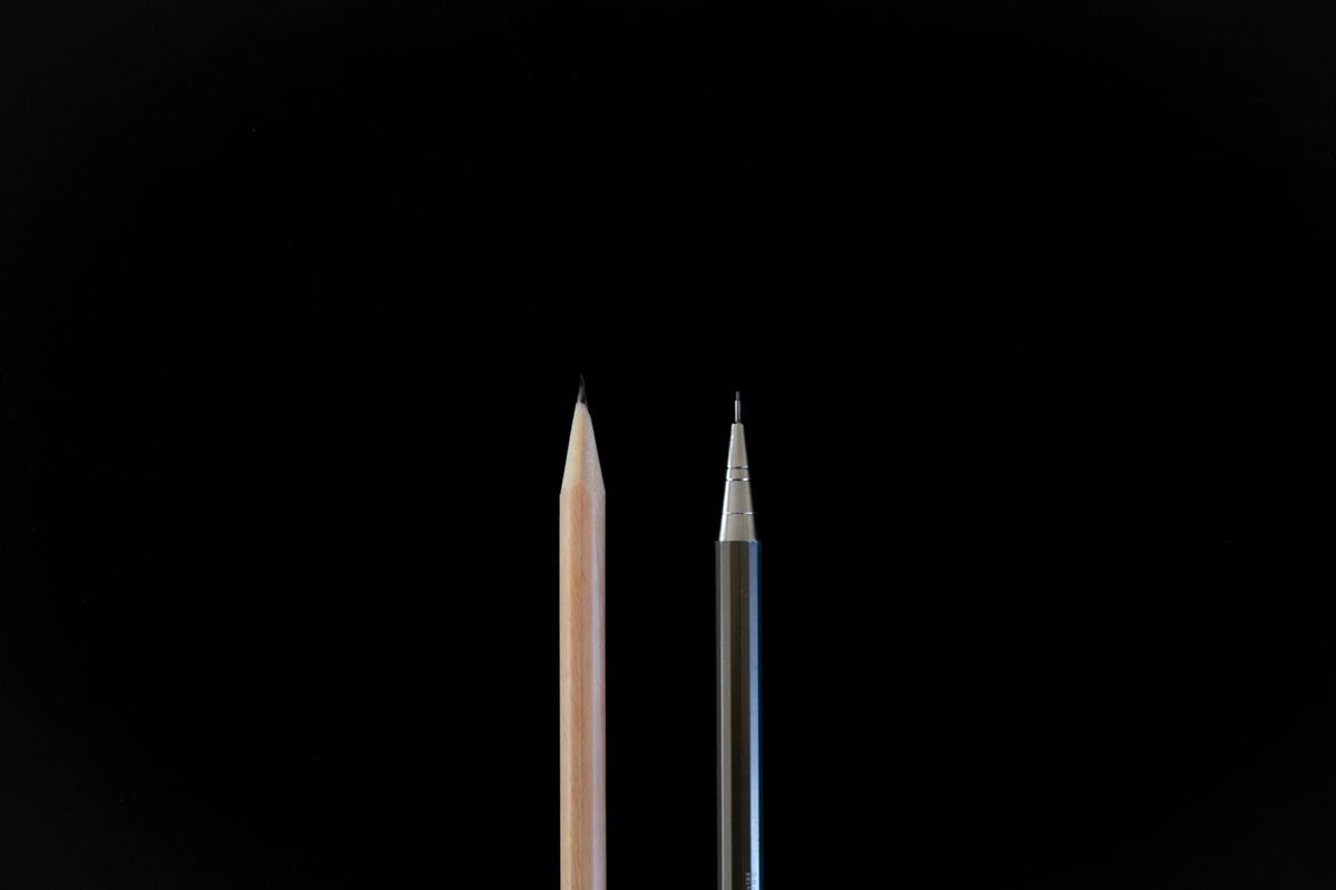 Colored pencils arranged on a surface