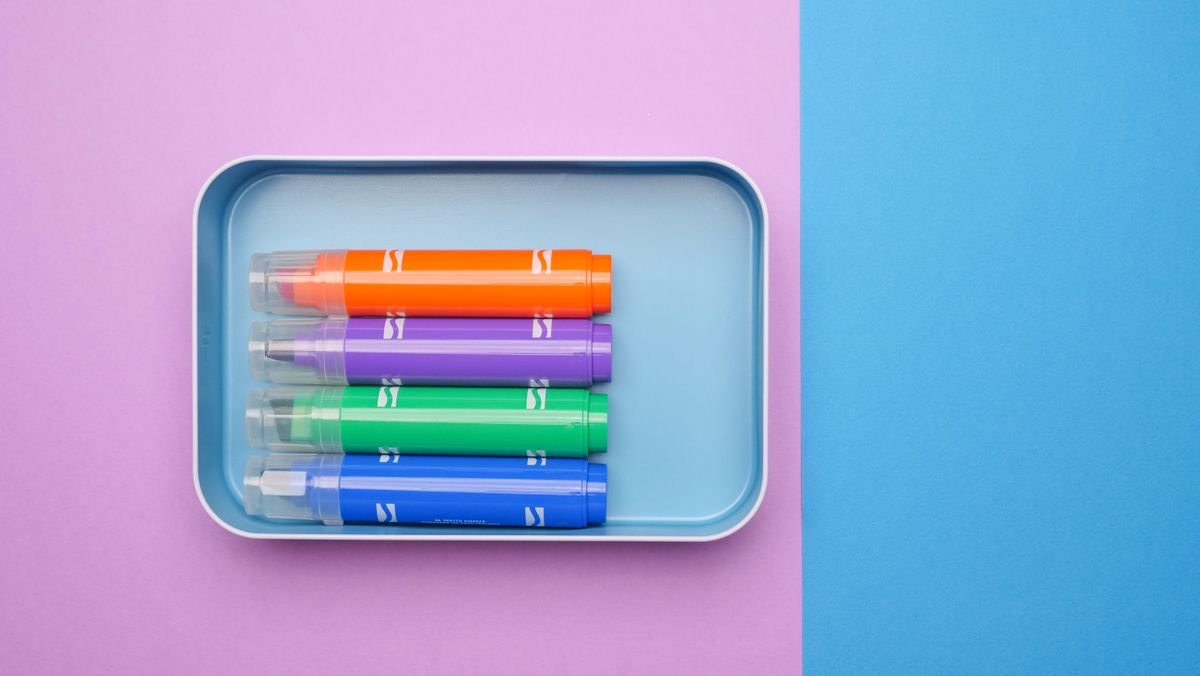 Colorful pens and art supplies
