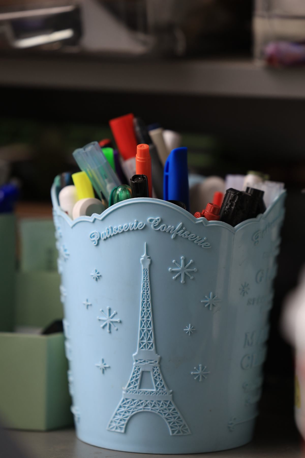 Art supplies and pencils in a portable case